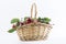 Ripe cherry in a wicker basket is isolated on a white background. Summer harvest of cherries