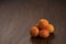 Ripe clementines on walnut wood table