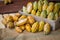 Ripe cocoa pod setup on rustic wooden background