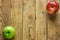 Ripe Colorful Red Green Apples on Weathered Wood Background. Corner Frame. Autumn Fall Thanksgiving Harvest. Copy Space