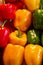 Ripe colorful vegetables sweet pepper yellow green red background culinary base