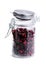 Ripe cowberry in glass jar.