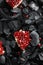Ripe cut pomegranate. Black charcoal background