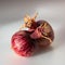Ripe dwarf pomegranate fruits on white surface