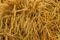 Ripe ears of wheat, background close-up horizontal backdrop. Dry straw, dried ears of wheat