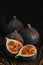 Ripe Fig Fruits on old wooden background. Paleo diet, still life with copy space. Shallow depth of the field