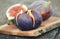 Ripe figs on the wooden table