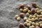Ripe filbert kernels and hazelnuts in a shell on burlap background. Healthy nutrition. Close-up. Copy space.