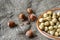 Ripe filbert kernels and hazelnuts in a shell on burlap background. Healthy nutrition. Close-up. Copy space.