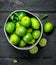 Ripe fragrant lime in a bucket