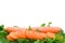 Ripe fresh carrot and slices over some parsley