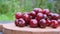 Ripe fresh sweet red cherry wooden background.