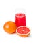 Ripe grapefruits and glass of juice