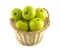 Ripe green apples inside brown wicker basket isolated closeup