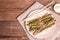 Ripe grilled asparagus. Wooden cutlery, healthy food concept