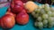 Ripe, juicy, large fruit nectarines, peaches and green grapes, close-up.