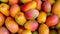 Ripe and juicy mangos background. AI generated.