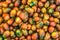 Ripe kumato tomatoes on a market stall