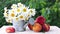 Ripe large peaches and daisies in a watering can isolated on green.