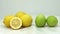 Ripe lemons and limes, rotating shot, white background
