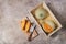 Ripe melons in a wooden box