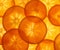 Ripe orange persimmon fruit slices as food background