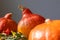 ripe orange pumpkins in the kitchen on the table, the holiday is very much. decorations for celebrating Halloween or for