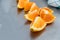 Ripe oranges slices on table