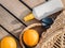 Ripe oranges, wicker basket and sunglasses. Top view