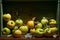 Ripe organic grown apples with leaves in wooden box in bright sunlight with copyspace. Natural fruit from garden concept image