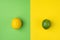 Ripe Organic Lemon and Lime on Split Duotone Green Yellow Background. Styled Creative Image. Citrus Fruits Vitamins