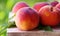 Ripe peaches , closeup on white table