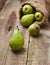 Ripe pear on a wooden background