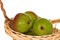 Ripe pears in handmade basket
