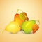 Ripe pears with leaves on light coloured background