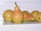 Ripe pears on light background