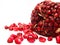 Ripe peeled pomegranate fruit and seeds on white