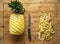 Ripe perfectly peeled pineapple, on a wooden background