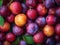 ripe plums fruit background closeup