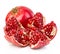 Ripe pomegranates close-up on a white background.