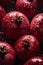 Ripe pomegranates with dewdrops close-up