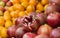 Ripe pomegranates and persimmon. Bright fruit background Selective focus