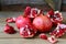 Ripe pomegranates on a rustic table