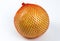 A ripe pomelo is packaged in a grid on a white