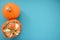 Ripe pumpkin and Turks turban squash on turquoise background