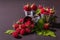 Ripe raspberries on a black stone concrete background