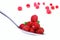 Ripe raspberries in a spoon