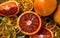Ripe red and dried sliced oranges. Sliced ripe juicy sicilian blood oranges. Dried oranges with blood oranges