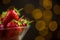 Ripe red strawberries in warm romantic colors with blur background.