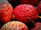 Ripe red strawberry lychee on market for sell mouthwatering collection asia india kolkata